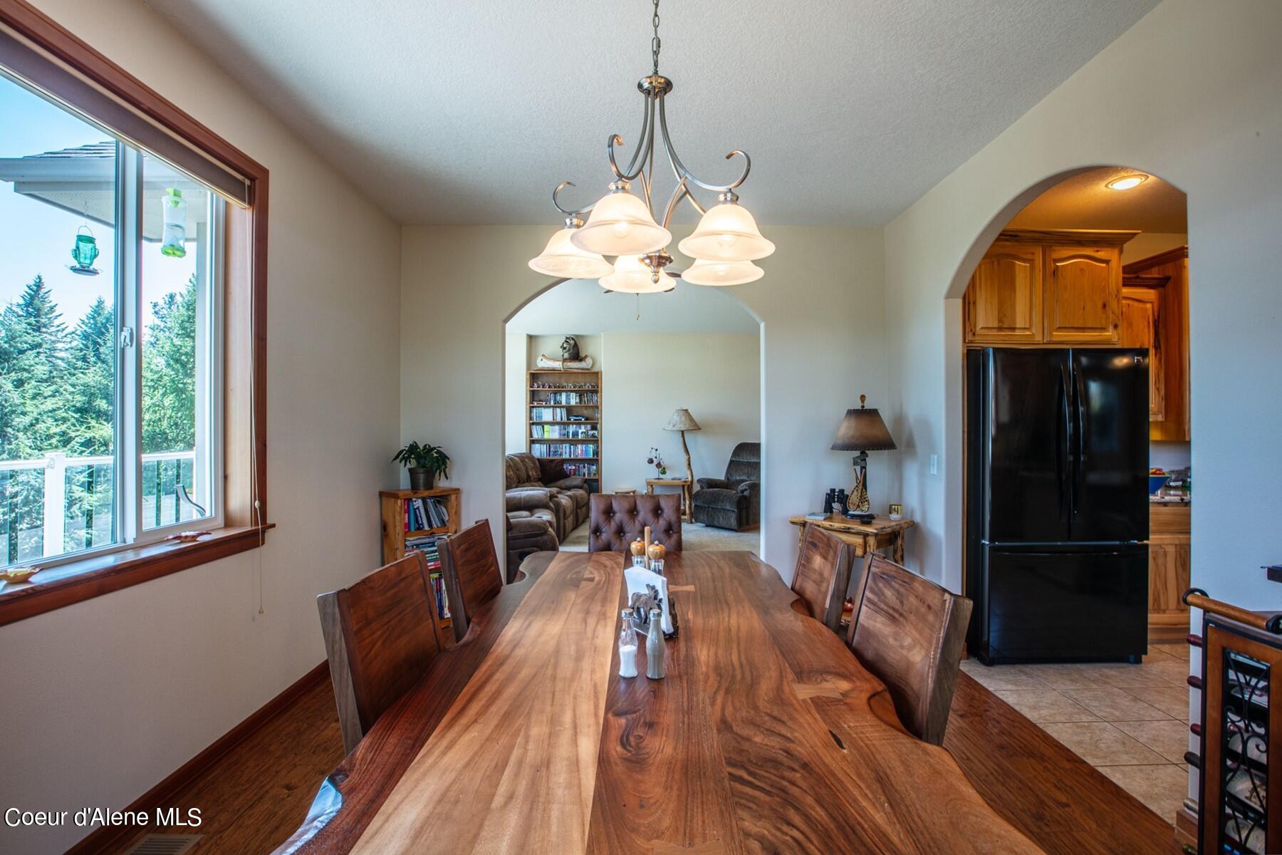 1524 Sunrise Road Bonners Ferry, ID 83805 - Photo 20 of 49 Dining room next to kitchen