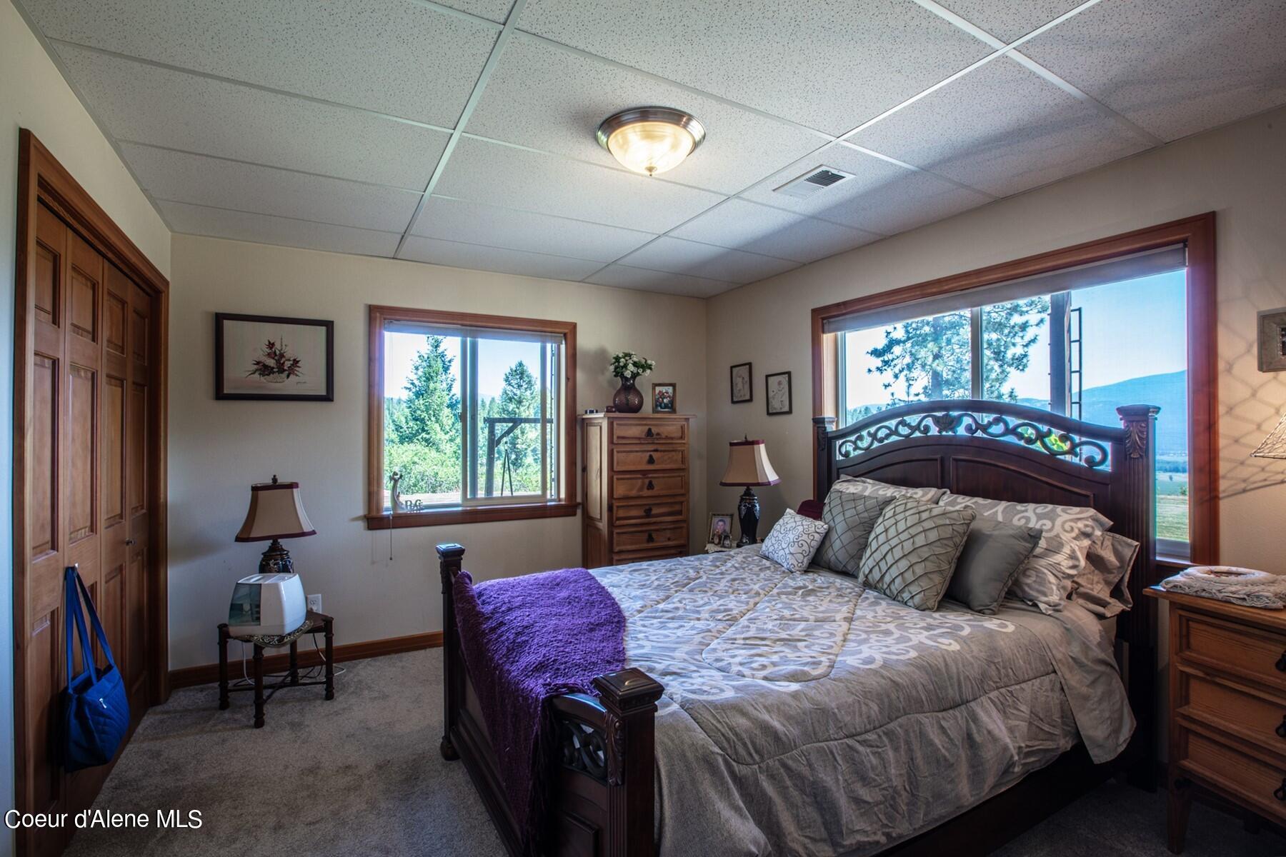 1524 Sunrise Road Bonners Ferry, ID 83805 - Photo 35 of 49 Downstairs Master bedroom