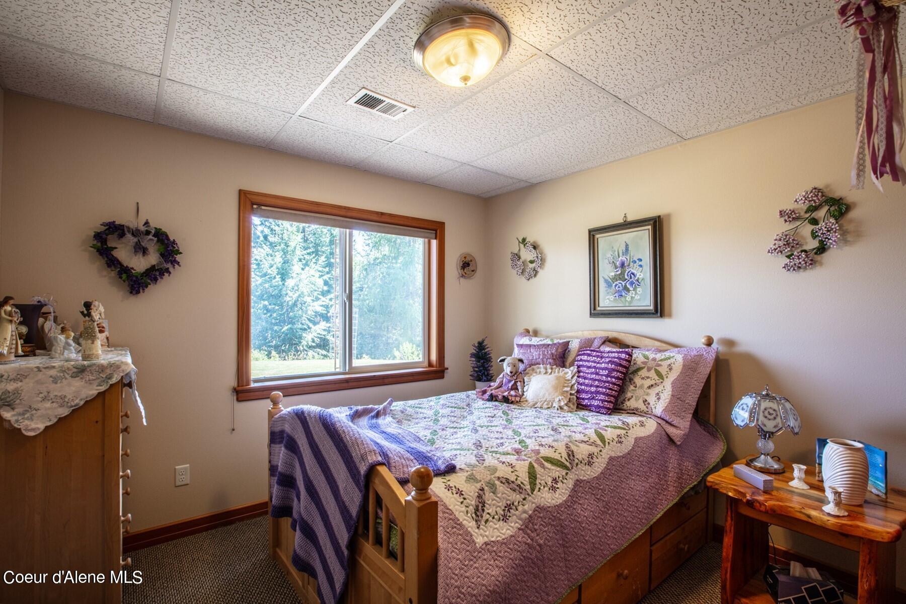 1524 Sunrise Road Bonners Ferry, ID 83805 - Photo 38 of 49 Downstairs guest bedroom 1