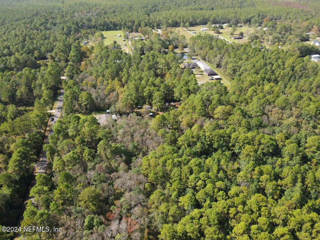 0 Cisco Gardens Road South Jacksonville, FL 32219 - Photo 5 of 12 an aerial view of a houses with yard