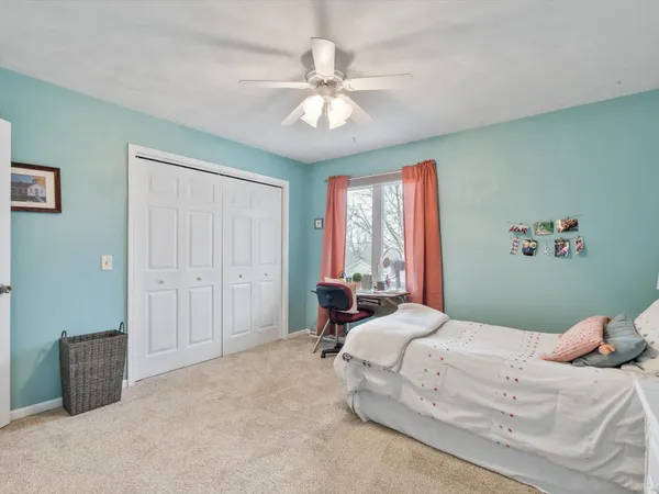 a view of a furniture in front of a room