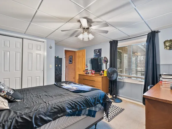 a view of balcony with wooden floor and outdoor seating