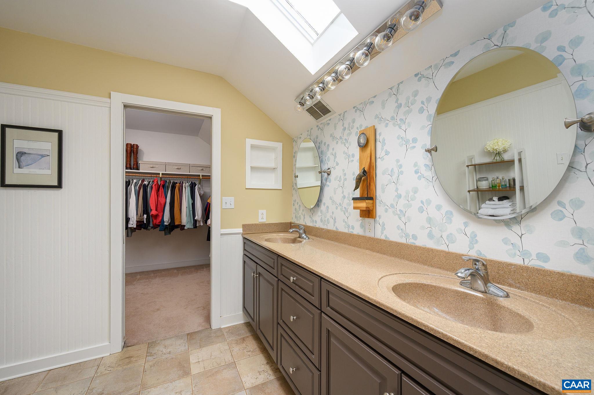 888 Wolf Trap Road Charlottesville, VA 22911 - Photo 24 of 63 a bathroom with a sink double vanity granite and a mirror