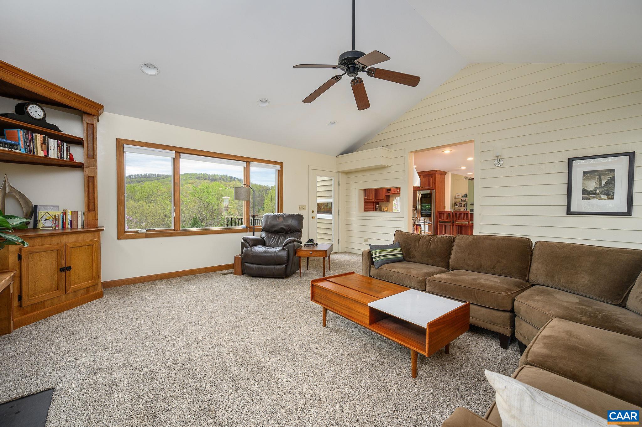888 Wolf Trap Road Charlottesville, VA 22911 - Photo 43 of 63 a living room with furniture and a large window