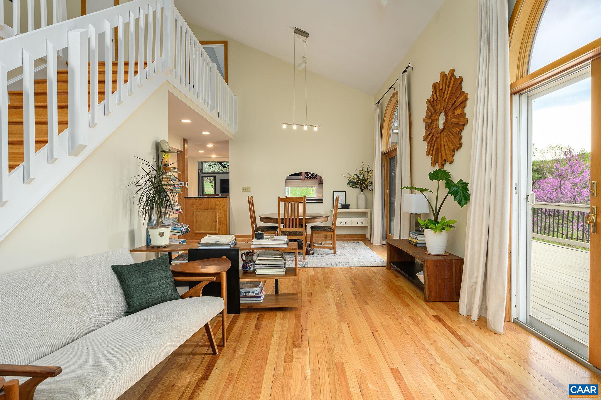 888 Wolf Trap Road Charlottesville, VA 22911 - Photo 6 of 63 a living room with furniture and wooden floor