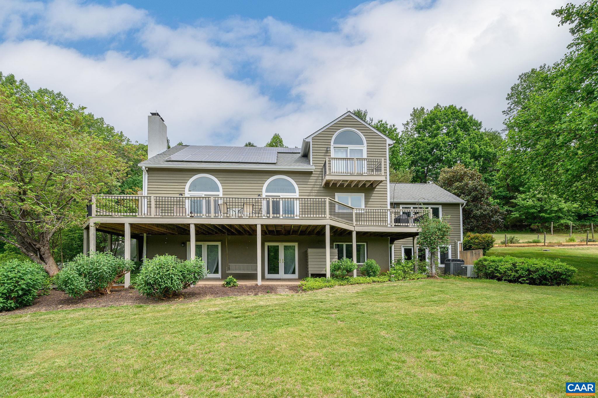 888 Wolf Trap Road Charlottesville, VA 22911 - Photo 63 of 63 a front view of a house with a garden
