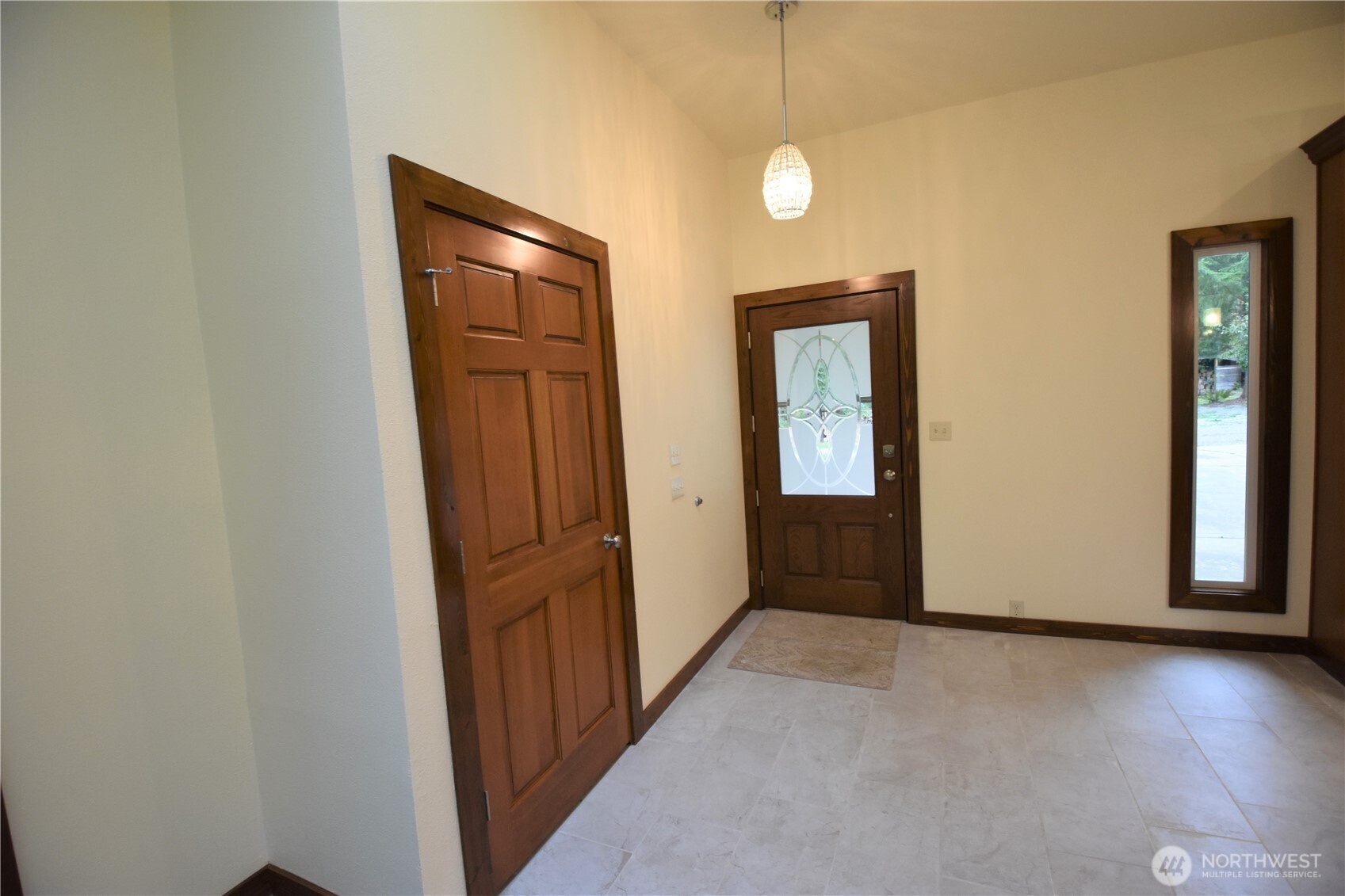 30331 Heimer Road Arlington, WA 98223 - Photo 14 of 37 a view of a hallway with wooden floor