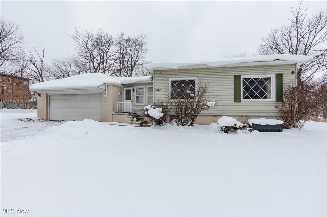 5062 Lee Road Maple Heights, OH 44137 - Photo 1 of 50 Ranch-style house with an attached garage