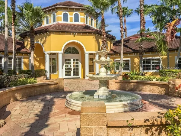 a front view of a house with swimming pool