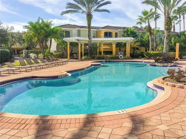 a view of a house with swimming pool