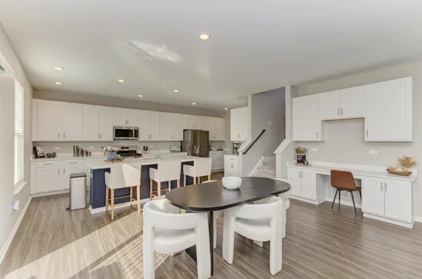 a view of kitchen with breakfast area
