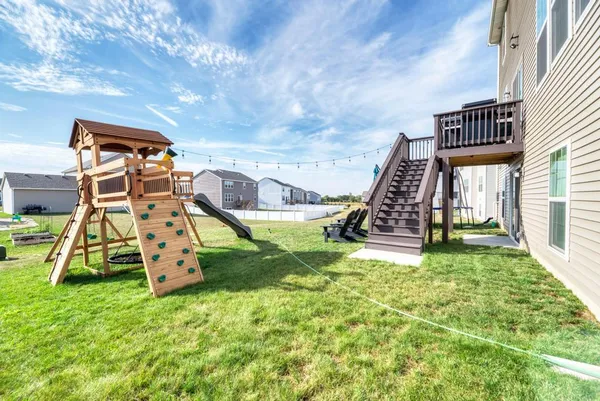 a house view with a backyard space