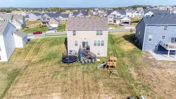 aerial view of residential houses with outdoor space