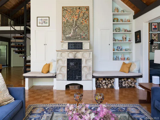 a living room with furniture and a rug