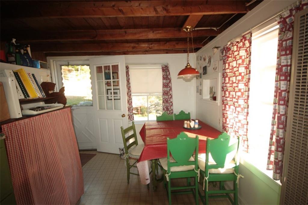 269 Shore Road Boothbay, ME 04544 - Photo 7 of 18 The dining room with vinyl square...