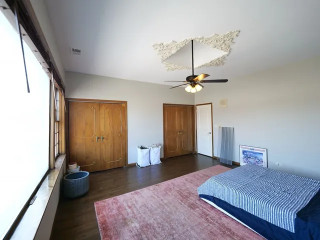 a utility room with cabinets washer and dryer