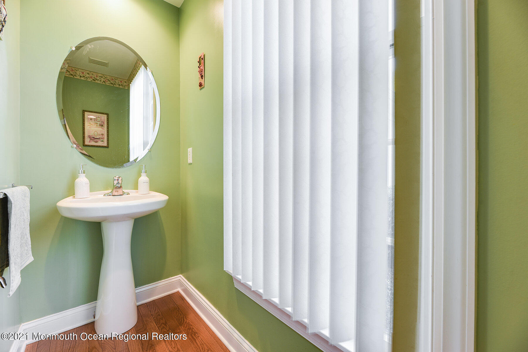 3 Great Bridge Road Freehold, NJ 07728 - Photo 21 of 40 a bathroom with a sink a mirror and tub
