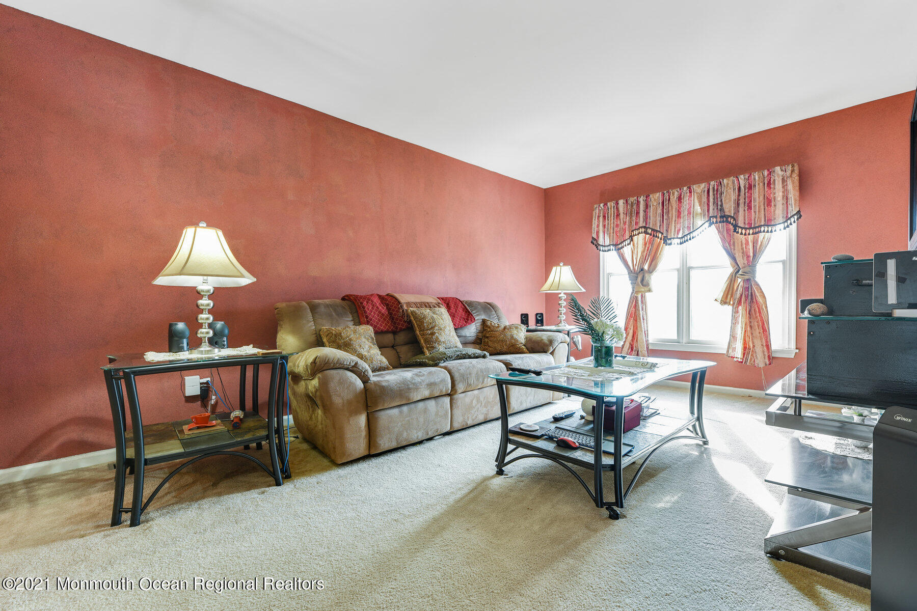 3 Great Bridge Road Freehold, NJ 07728 - Photo 24 of 40 a living room with furniture a flat screen tv and a large window