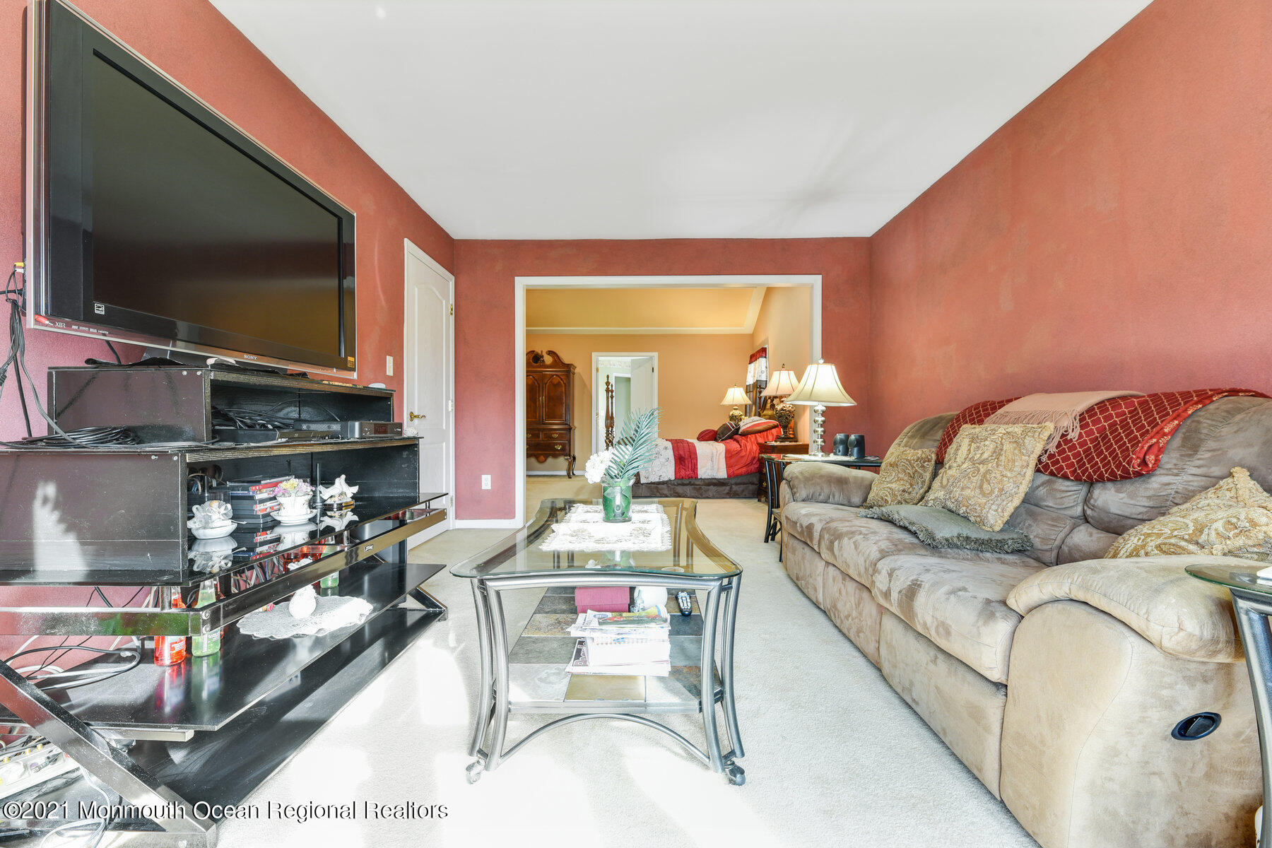 3 Great Bridge Road Freehold, NJ 07728 - Photo 25 of 40 a living room with furniture and a flat screen tv
