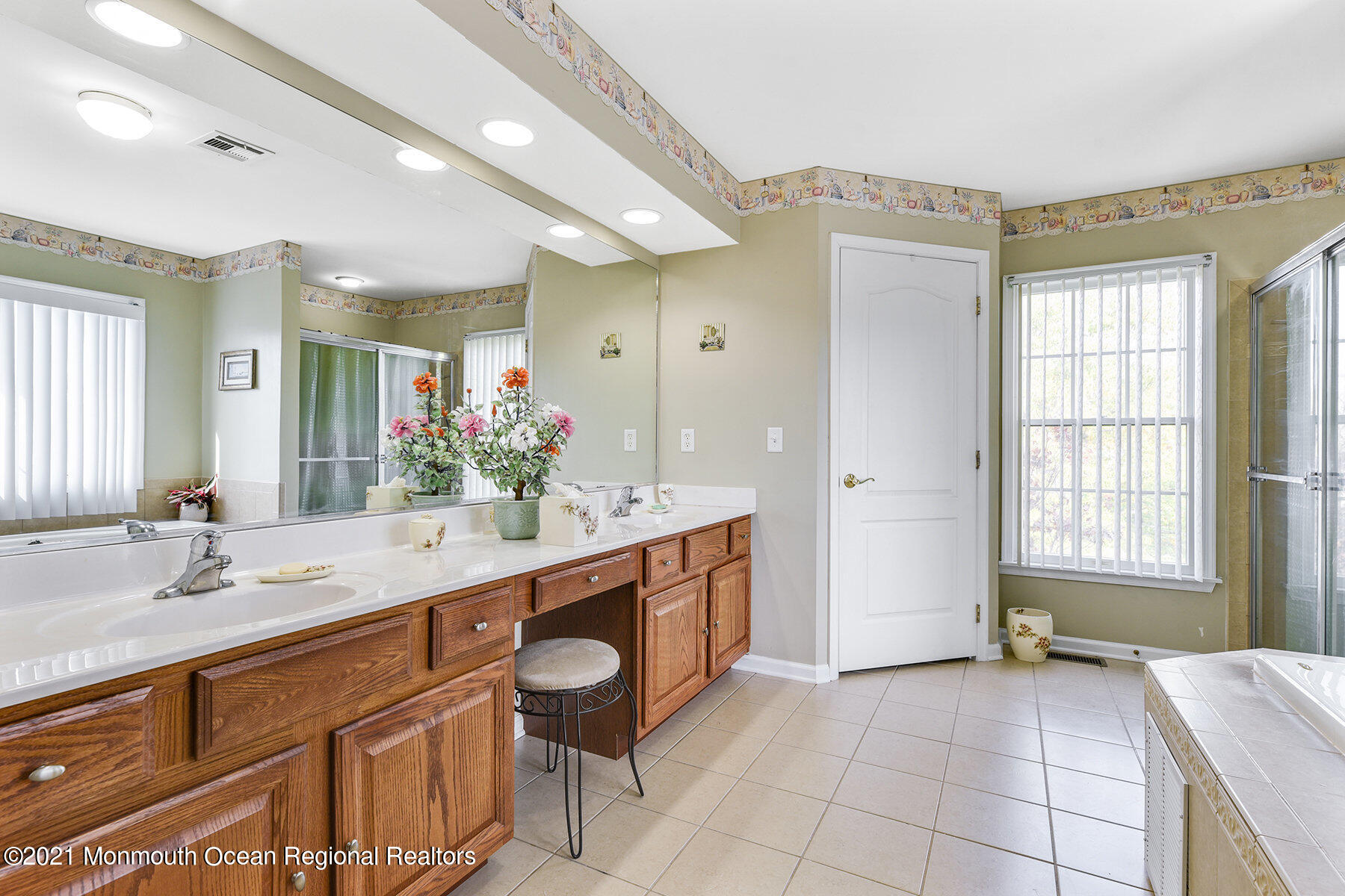 3 Great Bridge Road Freehold, NJ 07728 - Photo 26 of 40 a spacious bathroom with a granite countertop sink a mirror and a bathtub