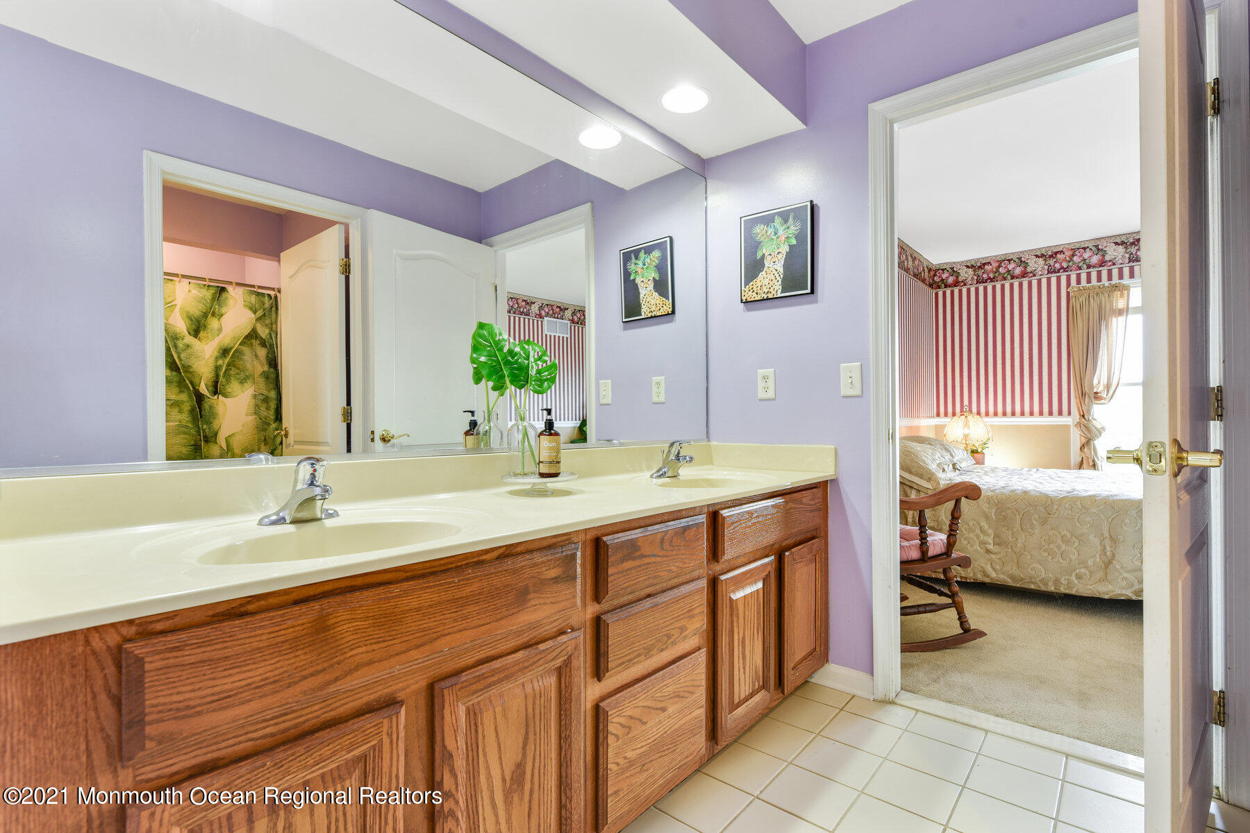 3 Great Bridge Road Freehold, NJ 07728 - Photo 29 of 40 a spacious bathroom with a double vanity sink and a large mirror