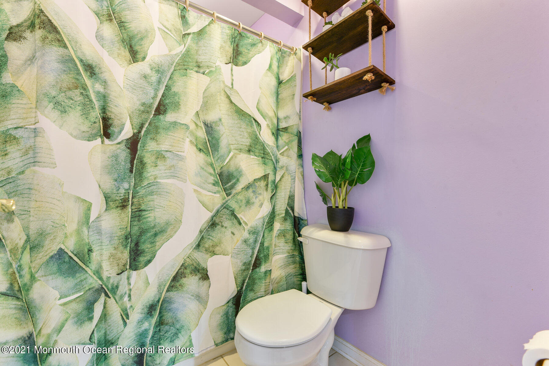 3 Great Bridge Road Freehold, NJ 07728 - Photo 30 of 40 a white toilet sitting next to a shower curtain