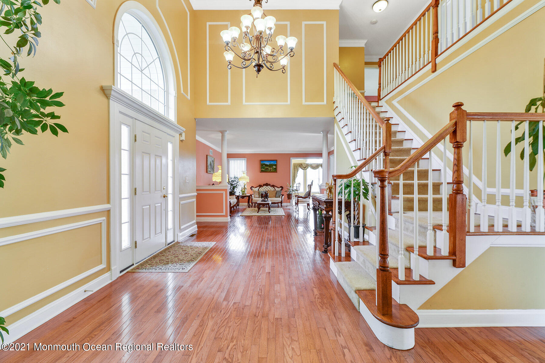 3 Great Bridge Road Freehold, NJ 07728 - Photo 4 of 40 a view of a livingroom with wooden floor and furniture