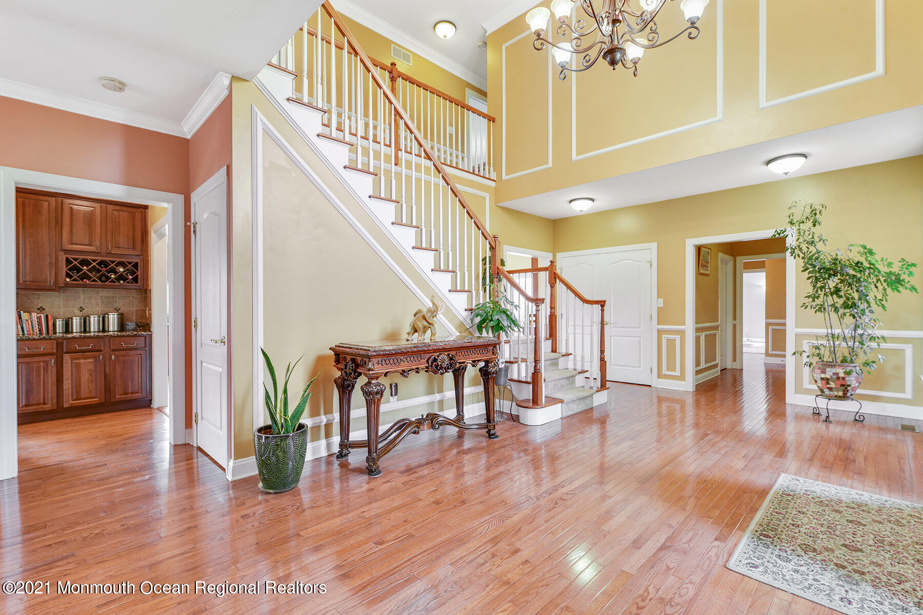 3 Great Bridge Road Freehold, NJ 07728 - Photo 6 of 40 a view of an entryway and hall with wooden floor