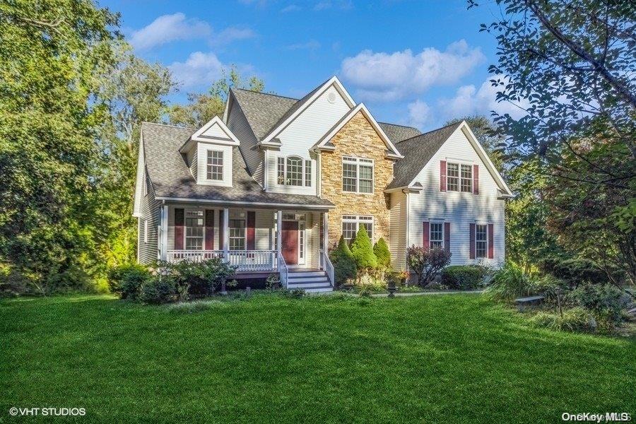 197 Highlands Drive Pawling, NY 12564 - Photo 1 of 1 a view of a house with brick walls and a yard with plants