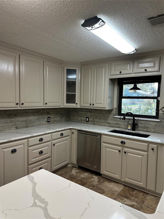 137 Oakview Circle Waco, TX 76705 - Photo 12 of 35 a kitchen with a sink cabinets and appliances