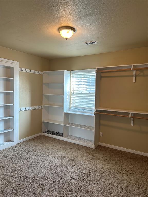 137 Oakview Circle Waco, TX 76705 - Photo 22 of 35 a view of an empty walk in closet