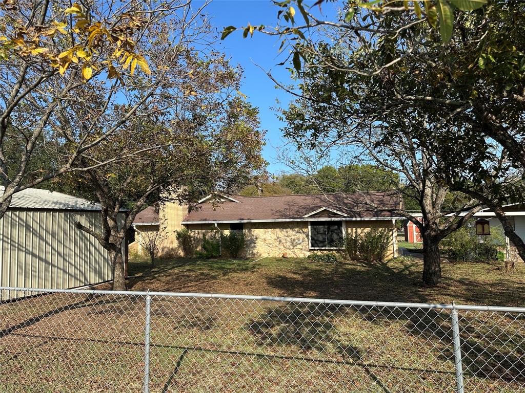 137 Oakview Circle Waco, TX 76705 - Photo 7 of 35 a view of a house with a yard