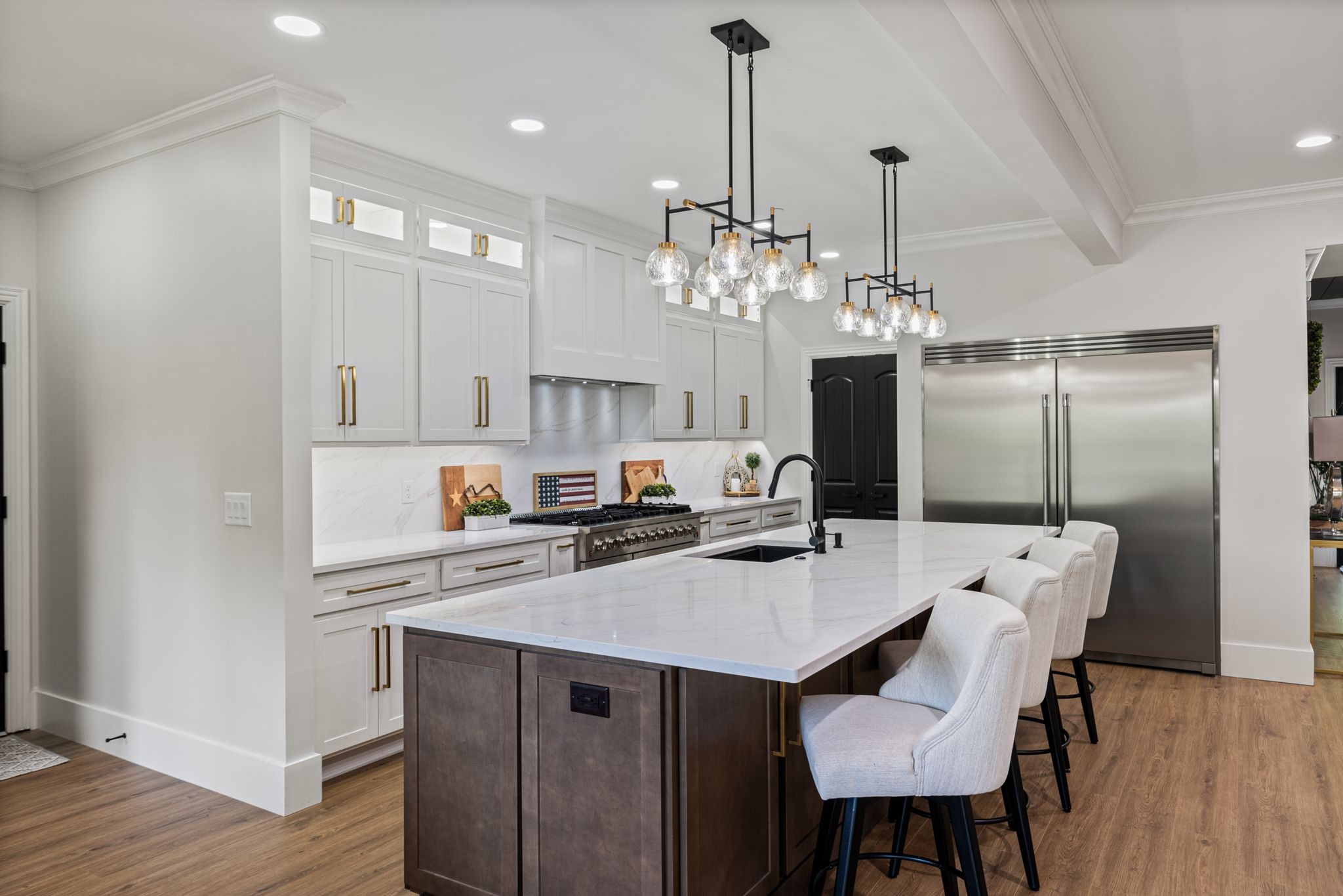 4024 Campania Strada Spring Hill, TN 37174 - Photo 17 of 53 a view of a dining room with furniture wooden floor and chandelier