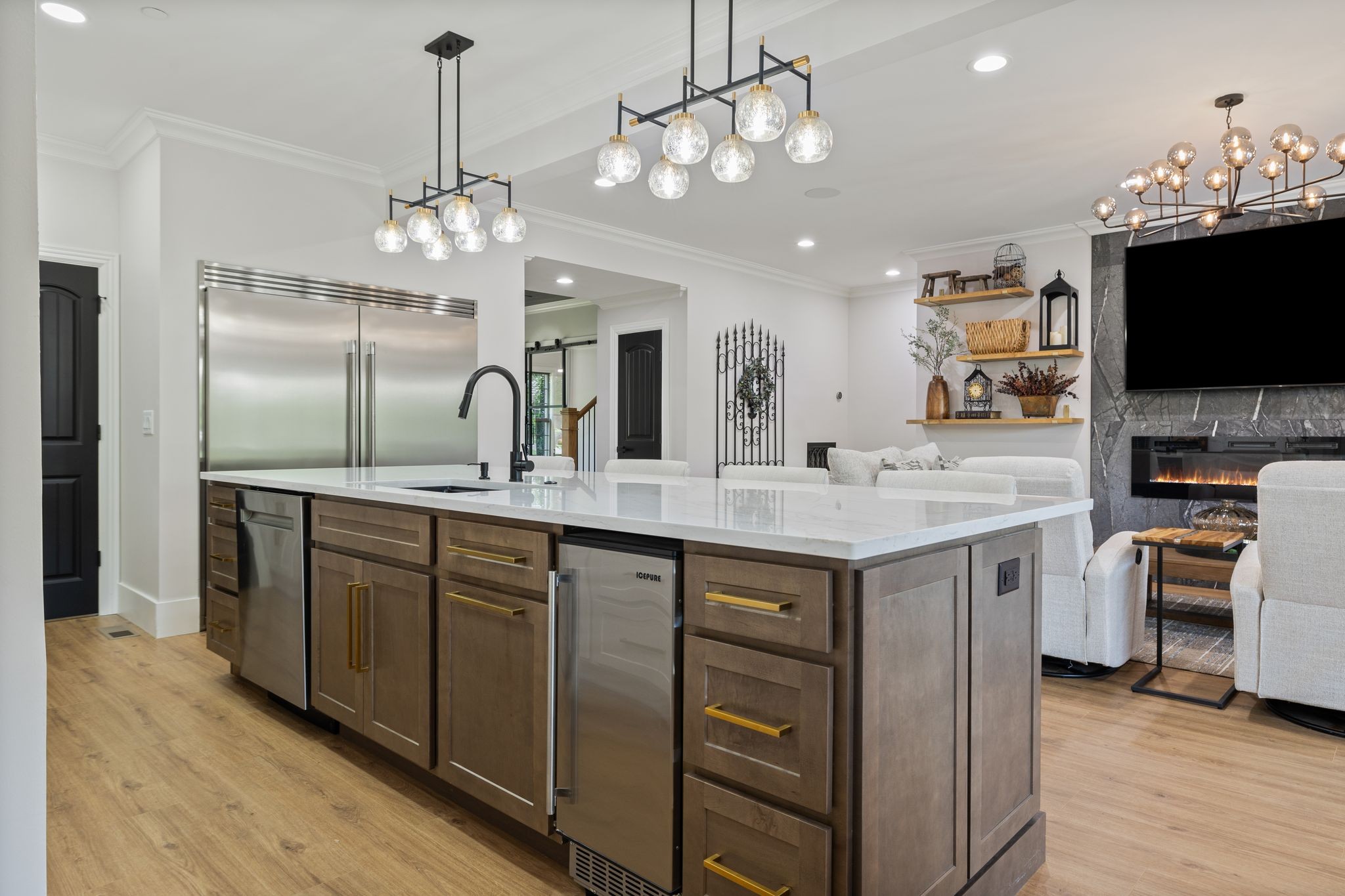 4024 Campania Strada Spring Hill, TN 37174 - Photo 18 of 53 a kitchen with kitchen island granite countertop stainless steel appliances a stove refrigerator and microwave