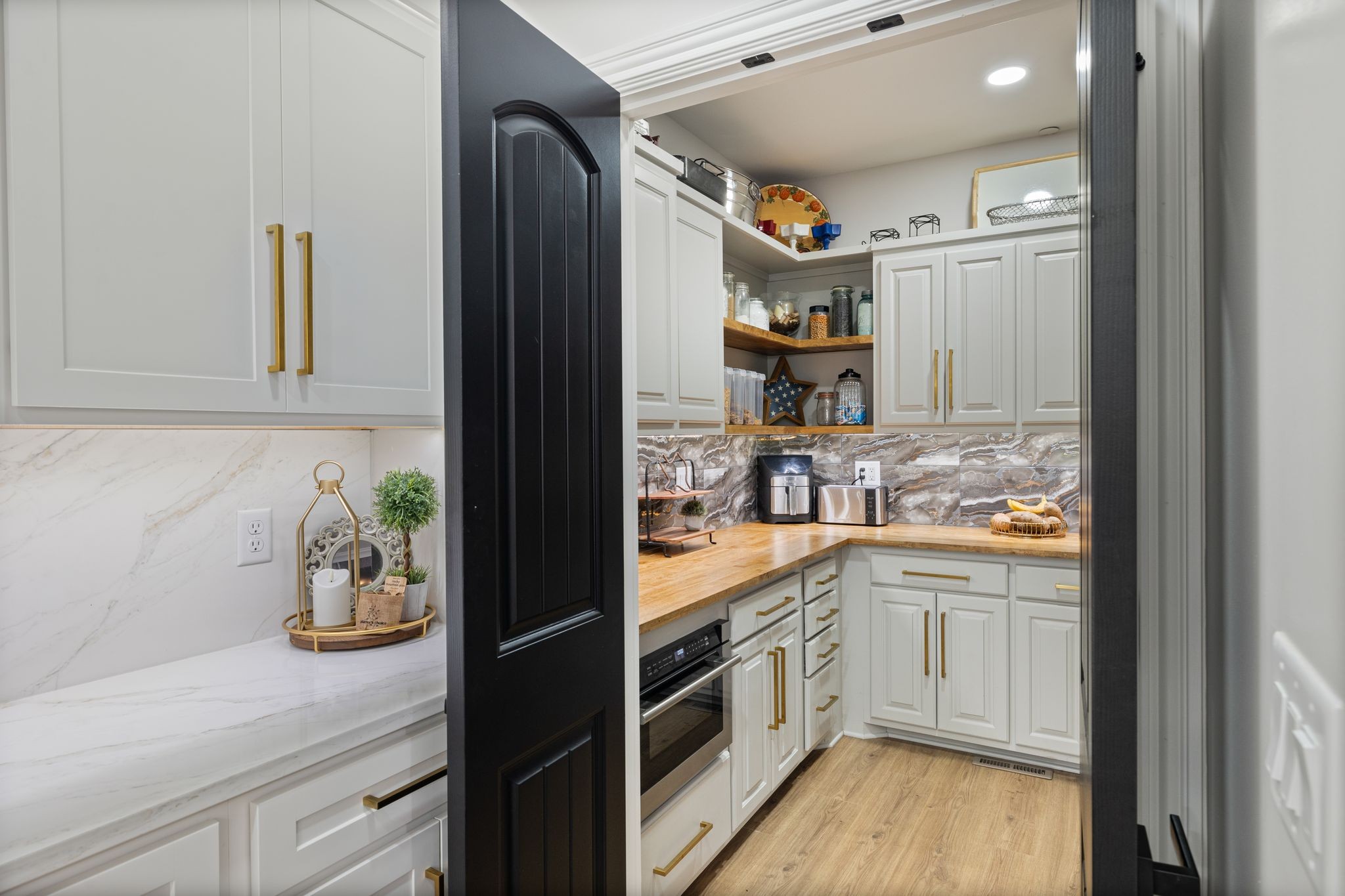 4024 Campania Strada Spring Hill, TN 37174 - Photo 21 of 53 a kitchen with stainless steel appliances granite countertop a sink and cabinets