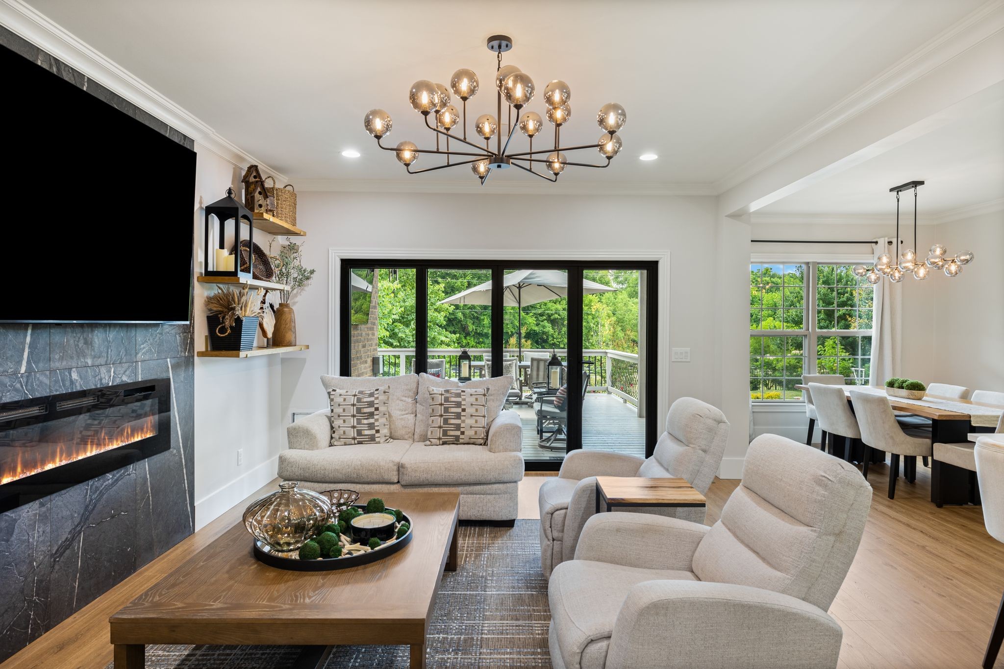 4024 Campania Strada Spring Hill, TN 37174 - Photo 26 of 53 a living room with furniture a flat screen tv and a fireplace