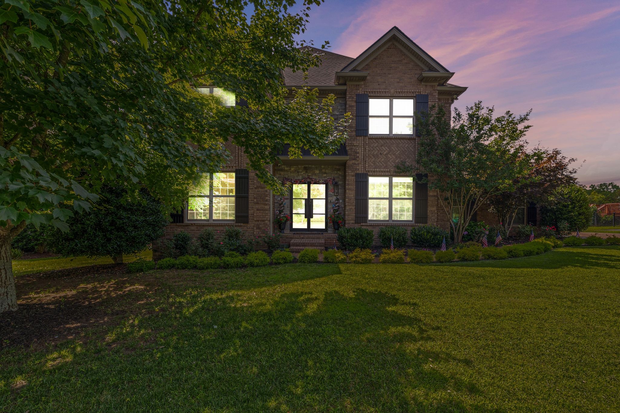 4024 Campania Strada Spring Hill, TN 37174 - Photo 3 of 53 a front view of a house with a yard