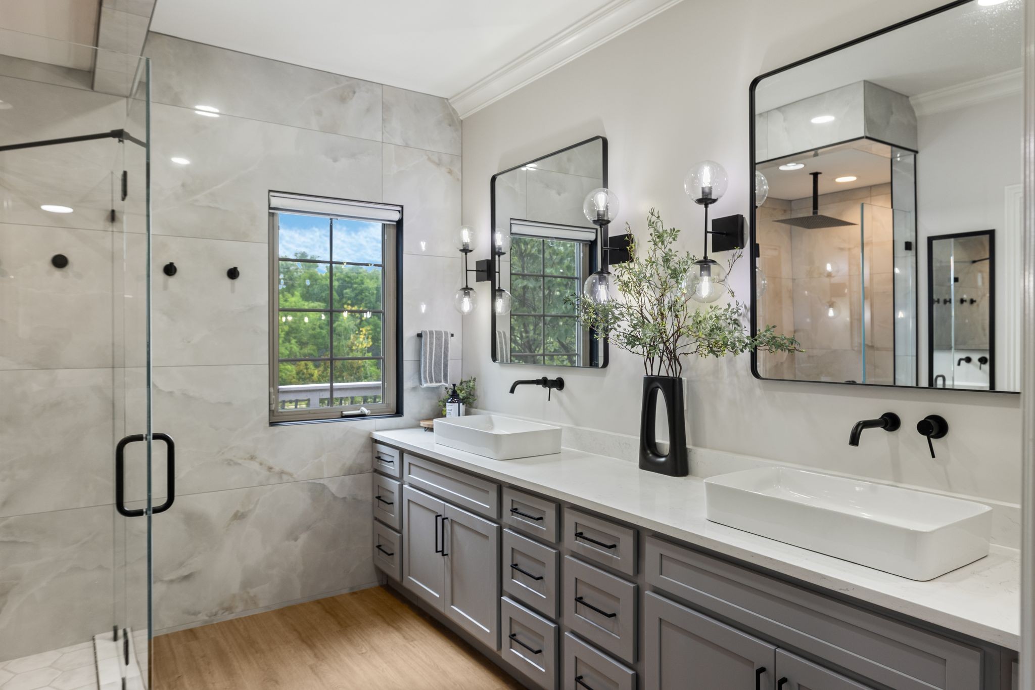 4024 Campania Strada Spring Hill, TN 37174 - Photo 31 of 53 a bathroom with double vanity sink a mirror and shower