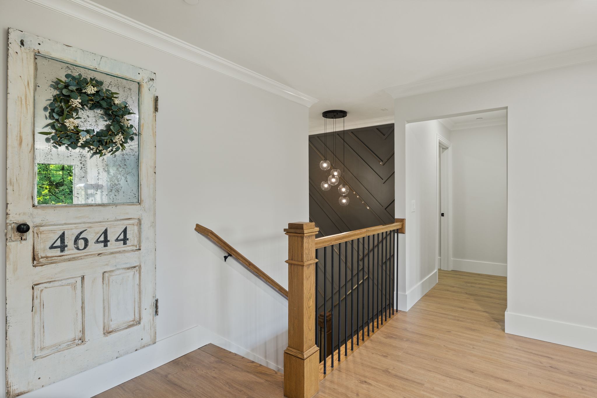 4024 Campania Strada Spring Hill, TN 37174 - Photo 38 of 53 a view of a hallway with wooden floor and windows