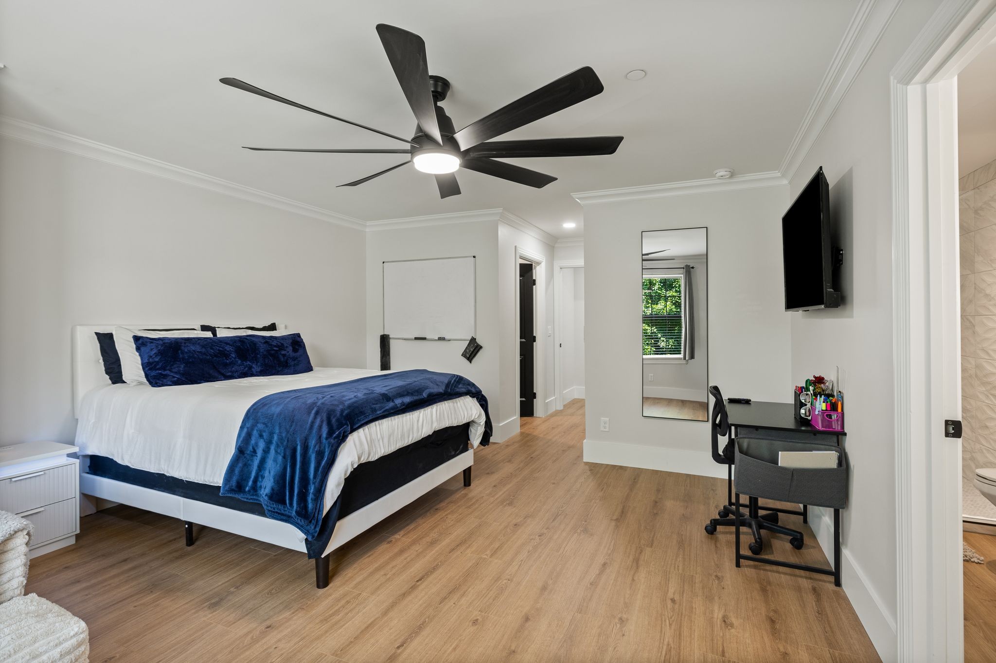 4024 Campania Strada Spring Hill, TN 37174 - Photo 39 of 53 a bedroom with a bed and a flat screen tv