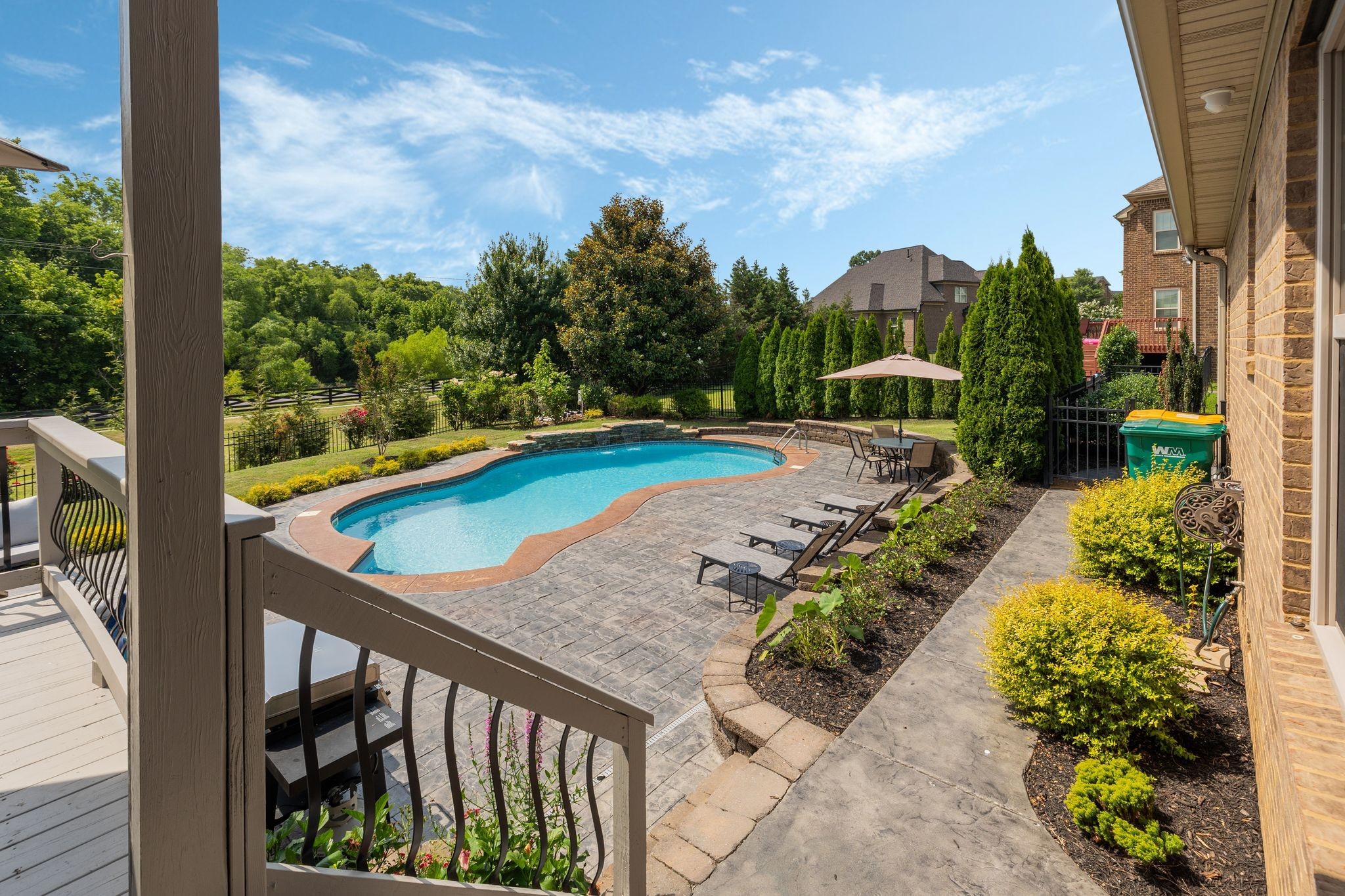 4024 Campania Strada Spring Hill, TN 37174 - Photo 51 of 53 a view of a swimming pool with a patio and a garden