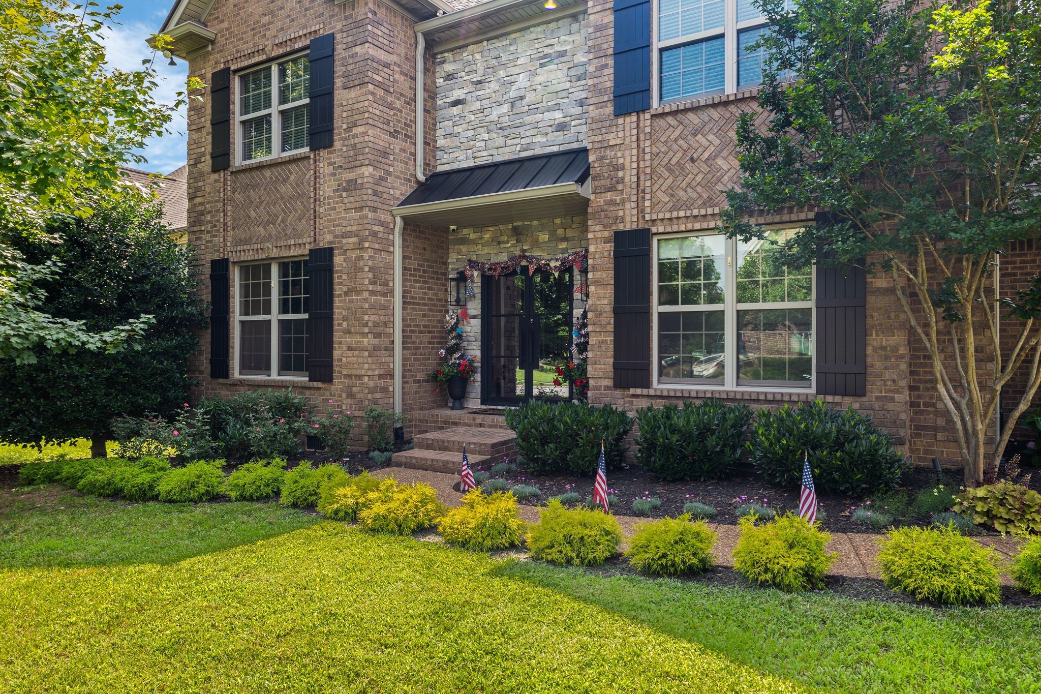 4024 Campania Strada Spring Hill, TN 37174 - Photo 6 of 53 front view of a house with a yard