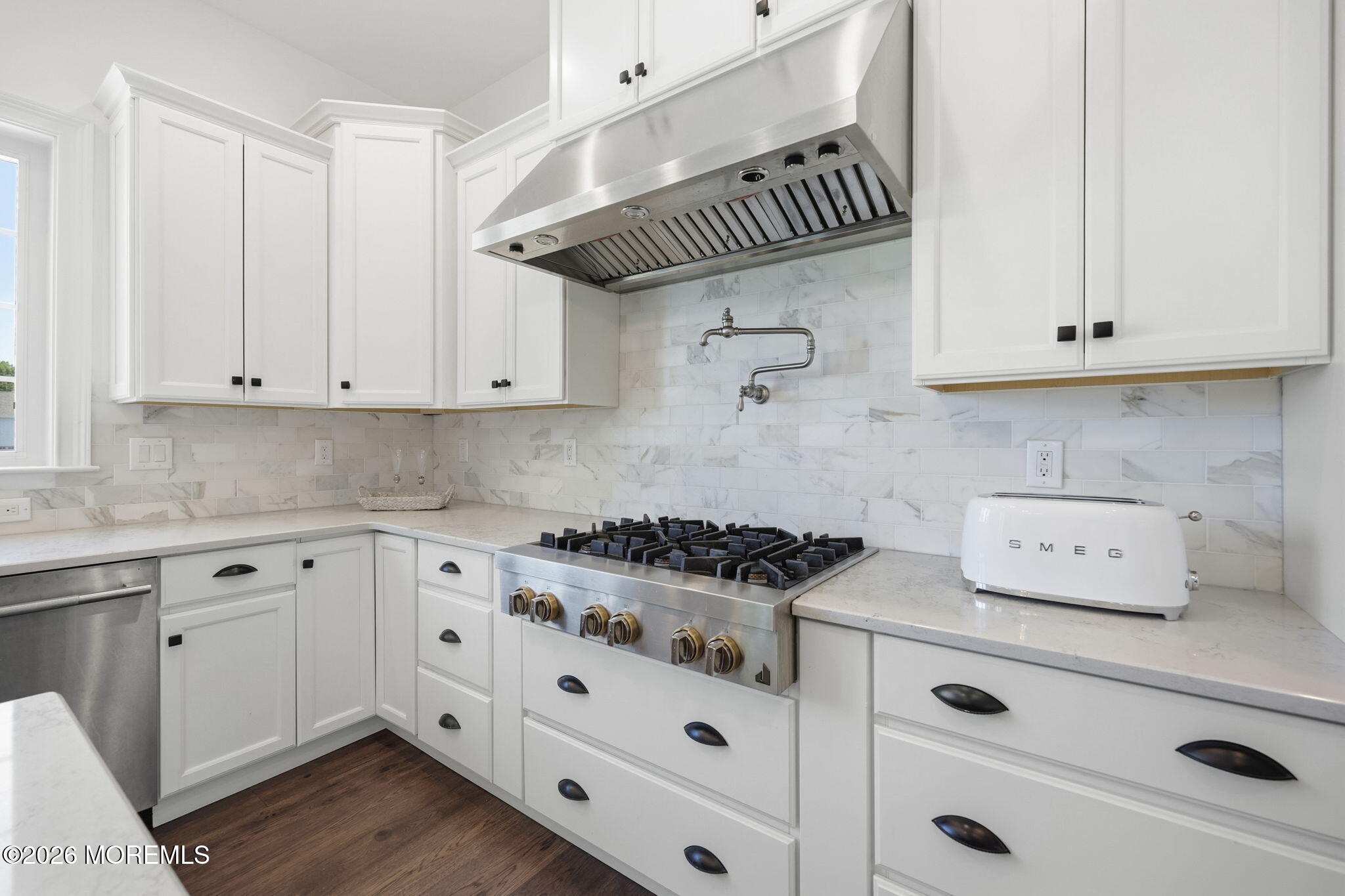 66 Windermere Road Lincroft, NJ 07738 - Photo 12 of 48 a kitchen with white cabinets and white appliances