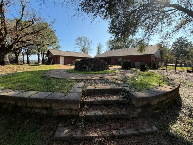 a view of backyard with seating space