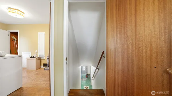 a room with a bed and a view of bathroom