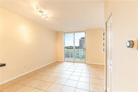 a view of an empty room and window