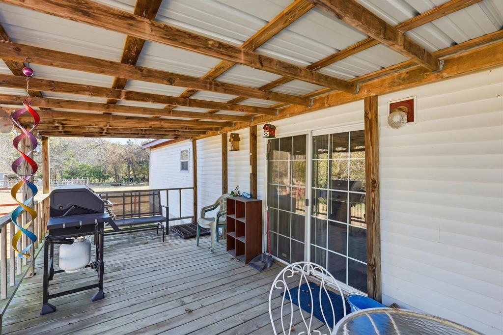 609 Cedar Mills Road Gordonville, TX 76245 - Photo 28 of 38 a view of sitting area with wooden floor