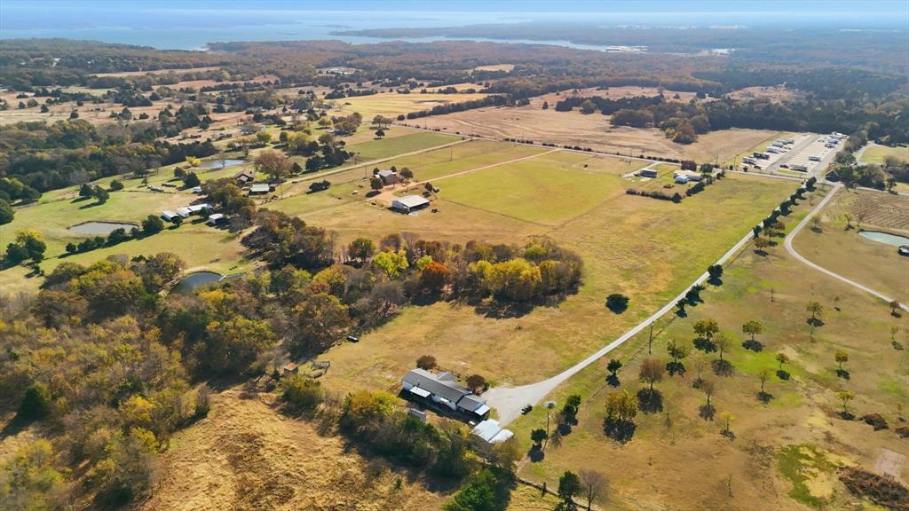 609 Cedar Mills Road Gordonville, TX 76245 - Photo 38 of 38 an aerial view of residential houses with outdoor space