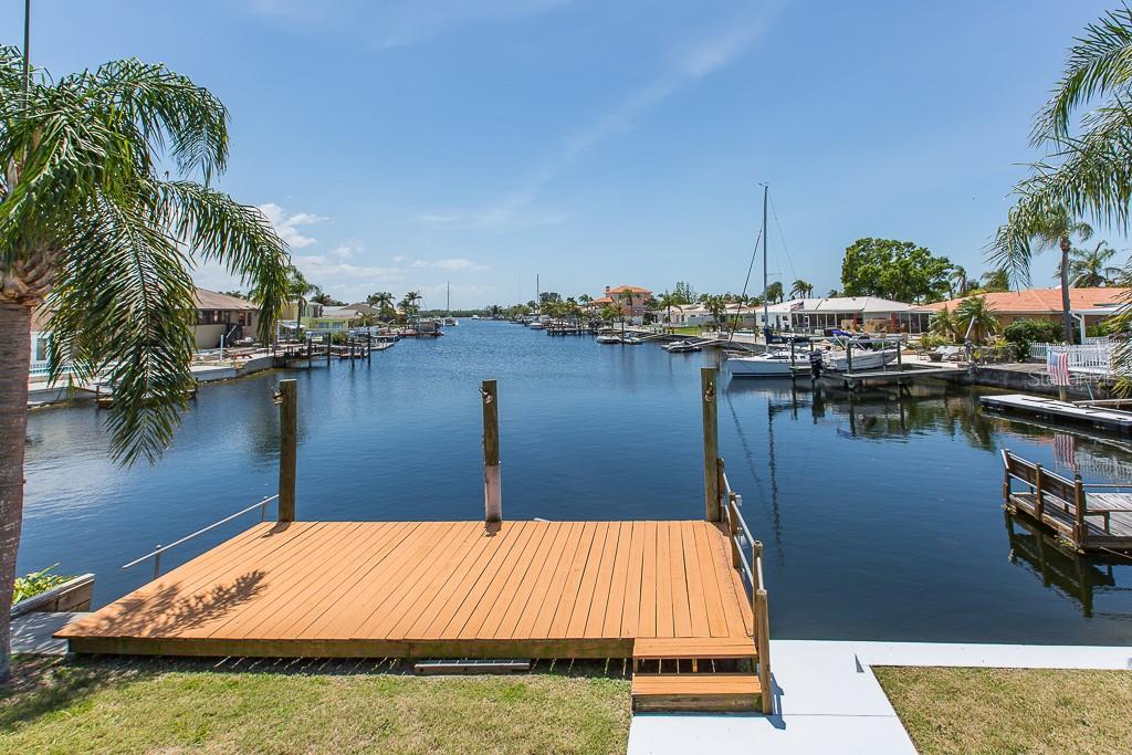 3810 Topsail Trail New Port Richey, FL 34652 - Photo 1 of 1 a view of outdoor space and lake view