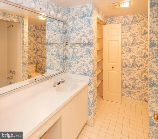 a bathroom with a toilet